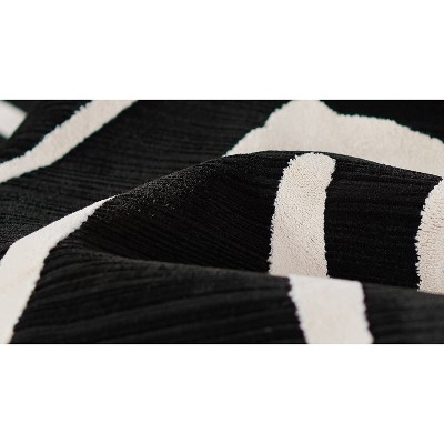 Black and Ivory Geometric Polyester Runner Rug