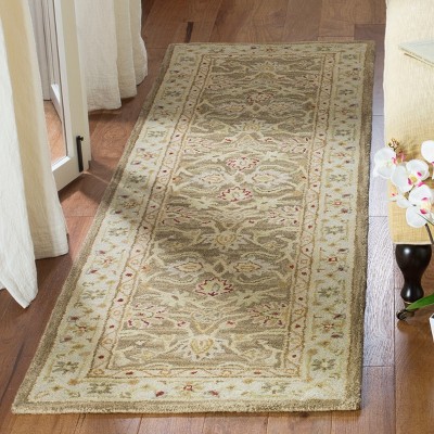 Handmade Tan and Ivory Wool Tufted Area Rug