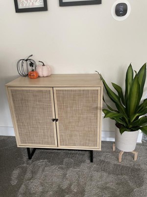 Nathan James Kova Natural Cane Rattan Doors Accent Cabinet with Black Metal Base and Adjustable Shelf