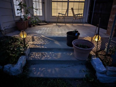 string lights on shepherds hooks - www.MLEvents.us  Outdoor string lights  patio, Solar garden decor, Best outdoor lighting