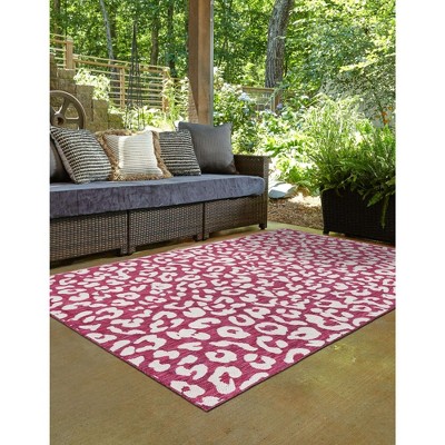 Magenta and White Synthetic 4' x 6' Outdoor Area Rug