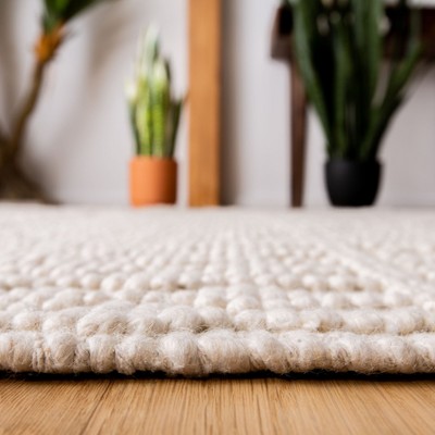 Ivory Coast Artisan Hand-Tufted Wool Rug - 5' x 8'