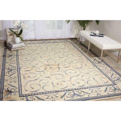 Ivory and Blue Rectangular Synthetic Area Rug
