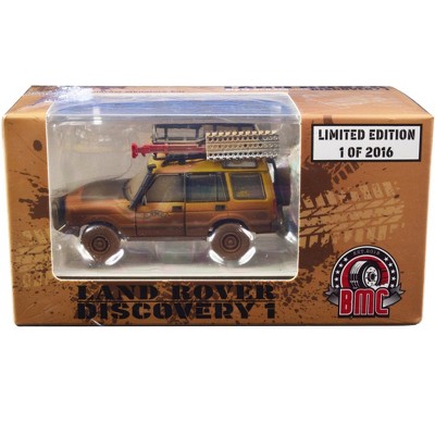 Land Rover Discovery 1 RHD "Camel Trophy" Yellow (Dirty Version) w/Rack and Accessories 1/64 Diecast Model Car by BM Creations