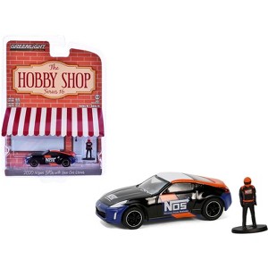 2020 Nissan 370z "NOS Nitrous Oxide Systems" Black with Graphics and Race Car Driver 1/64 Diecast Model Car by Greenlight - 1 of 3