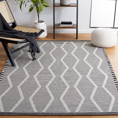 Nomadic Charm Flat-Woven Synthetic Black & Ivory Rug 6'4" x 9'6"