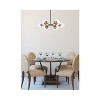 Elegant Lighting Briggs 30 inch pendant in black and brass with clear shade - 2 of 4
