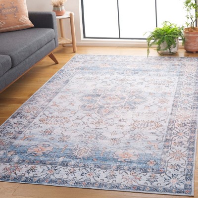 Ivory and Light Blue Weathered Medallion Washable Area Rug