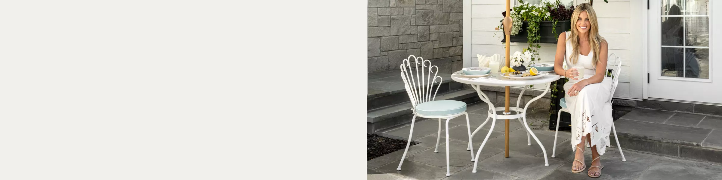 Shea McGee sitting at an outdoor bistro table