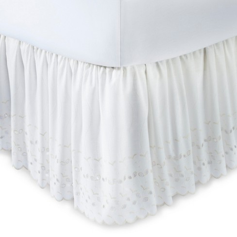 white bed skirt with split corners