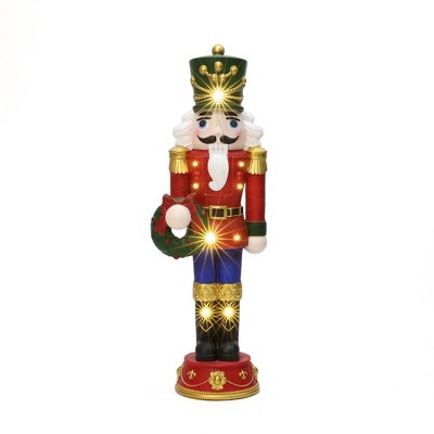 LuxenHome Lighted Nutcracker Red Soldier with Wreath, Battery Operated Christmas Decoration