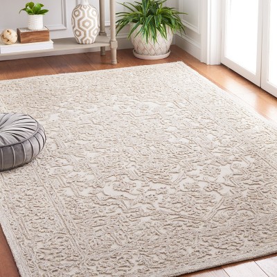 Ivory and Natural 4' x 6' Hand Tufted Wool Area Rug