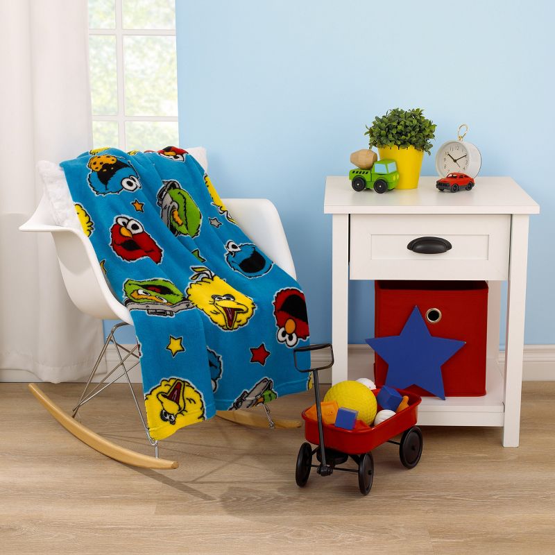 Sesame Street Come and Play Blue, Green, Red and Yellow, Elmo, Big Bird, Cookie Monster, and Oscar the Grouch Toddler Blanket, 3 of 6