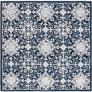 Roslyn ROS603 Hand Tufted Indoor Rugs - Safavieh - 1 of 4