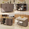 51" Farmhouse Rolling Kitchen Island Kitchen Storage Cart on Lockable Wheels with Drop Leaf, Storage Racks, Towel Rack, Brown/Black-ModernLuxe - 3 of 4
