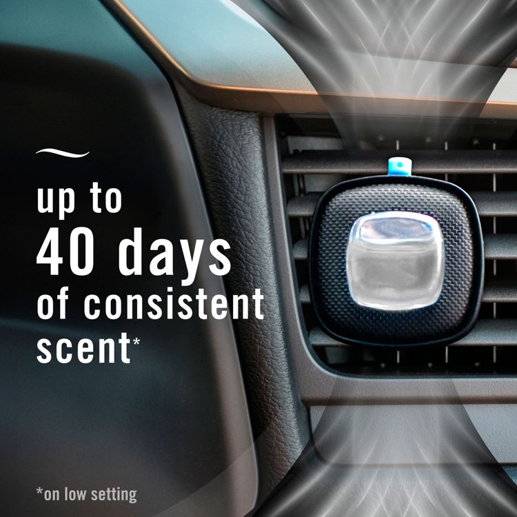 Car air freshener attached to a vent with text stating "up to 40 days of consistent scent" and "*on low setting."