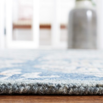 Capri Blue and Ivory Hand-Tufted Wool Area Rug
