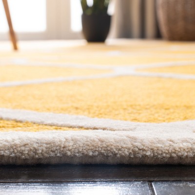 Gold and Ivory Geometric Hand-Tufted Wool Area Rug