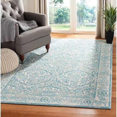 Ivory and Light Blue Synthetic Round Area Rug, 4' x 6'