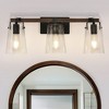 DORESshop 24 in. 3-Light Black and Faux Wood Vintage Farmhouse Vanity Light with Clear Glass Bell Shades for Bathroom - 2 of 4