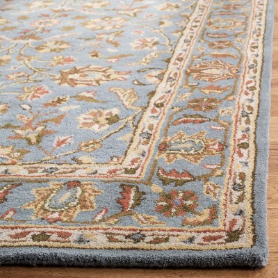 Blue 6' x 9' Hand-Tufted Wool Traditional Area Rug