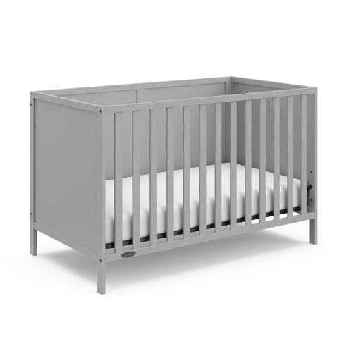 Graco pebble 2025 grey crib