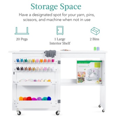 Compact White Sewing & Craft Table with Storage and Wheels