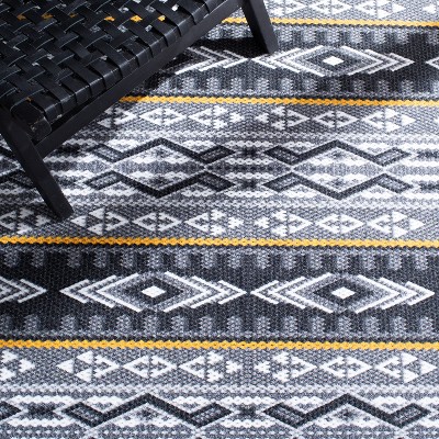 Gray and Gold Tribal Pattern Washable Synthetic Rug, 4'4" x 6'