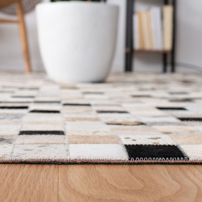 Handmade Black Geometric Cowhide Hand-knotted Rug 27" x 7"
