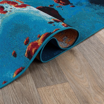 Galactic Wonder Blue and Red Synthetic Area Rug 5' x 7'