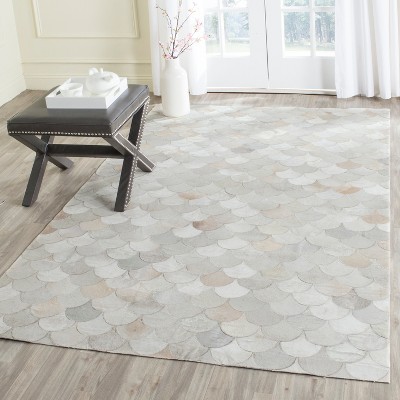 Ivory Geometric Handmade Cowhide Area Rug