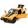 1977 Chevrolet Camaro Off-Road Version Yellow Met. w/Black Stripes & Statue "Transformers" (2023) 1/24 Diecast Model Car by Jada - 2 of 4