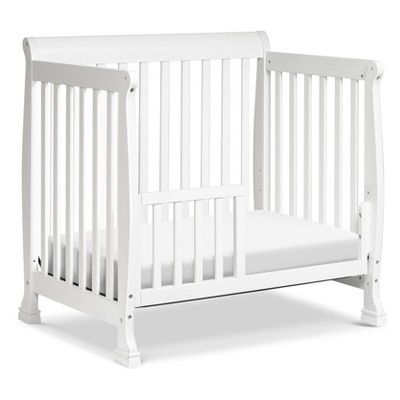 White Wooden 4-in-1 Convertible Mini Crib and Dresser Set