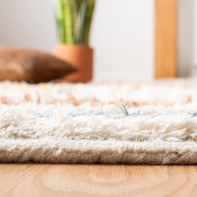 Ivory and Blue Hand-Knotted Wool Tribal Area Rug