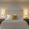 Globe Electric 1-Light Matte Brass Plug-In or Hardwire Wall Sconce with Off-White Pleated Fabric Shade - 4 of 4