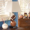 Signature Design by Ashley Nyx Table Lamp: Sports-Themed, Empire Shade, Polyresin Base, UL Listed - 2 of 4