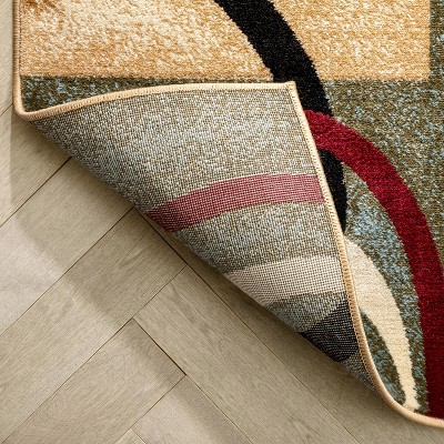 Ivory and Beige Geometric Synthetic 8' x 10' Area Rug
