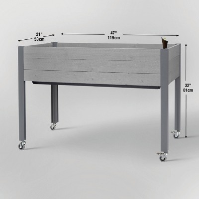 47" Gray Self-Watering Elevated Cedar Planter with Casters