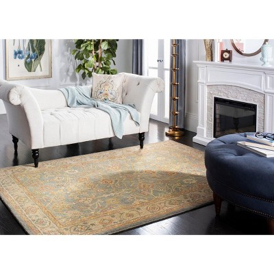 Handmade Blue and Ivory Tufted Wool Area Rug