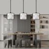 PAKOKULA 60-Wattt 1 Light Black Pendant Light With Open Metal Circle Cage and White Drum Fabric Shade - 4 of 4