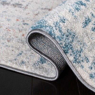 Ivory and Dark Blue Abstract 6' x 9' Washable Rug