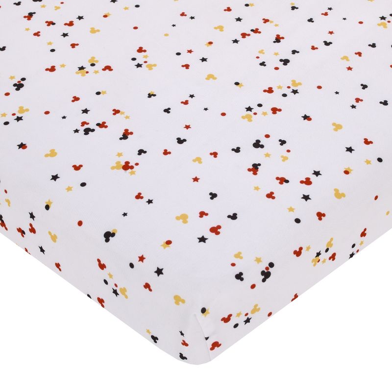 Disney Mickey Mouse - Red, Yellow, Black and White Mickey Confetti Nursery Fitted Mini Crib Sheet, 1 of 6