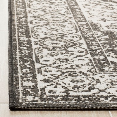 Linden Light Grey & Charcoal Geometric Synthetic Area Rug - 6'7" x 9'2"