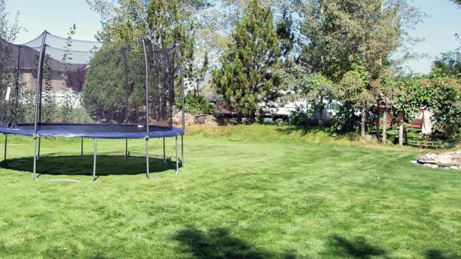 Skywalker Trampolines 15&#39; x 13&#39; Oval Trampoline Combo with Spring Pad - Navy, 2 of 7, play video