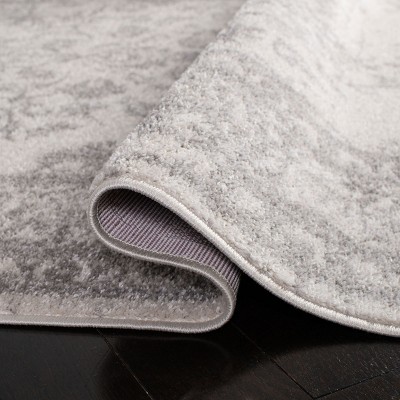 Chic Ivory & Silver 6' Round Synthetic Easy-Care Area Rug