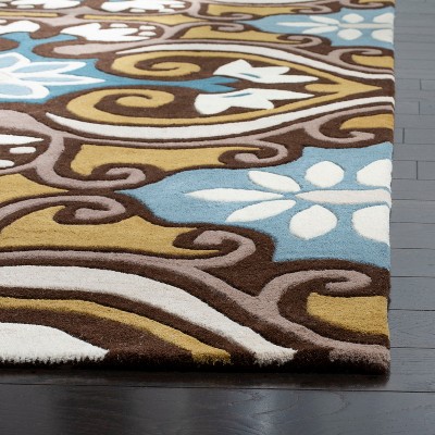 Wyndham Blue and Multi Wool 4' x 6' Hand-Tufted Area Rug