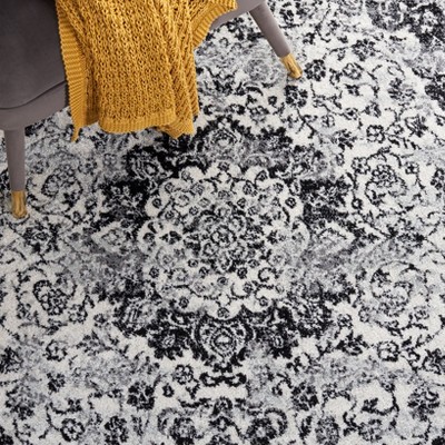 Ivory and Black Square Synthetic Area Rug