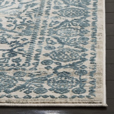 Blue and Beige Floral Motif High Pile Area Rug