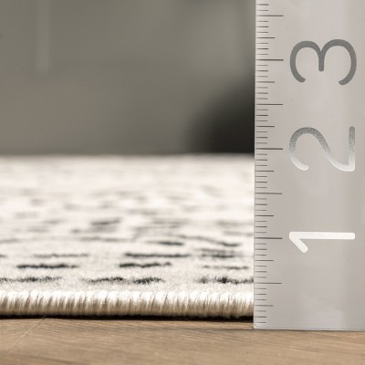 Olivia Moroccan 4' x 6' Black and White Synthetic Area Rug