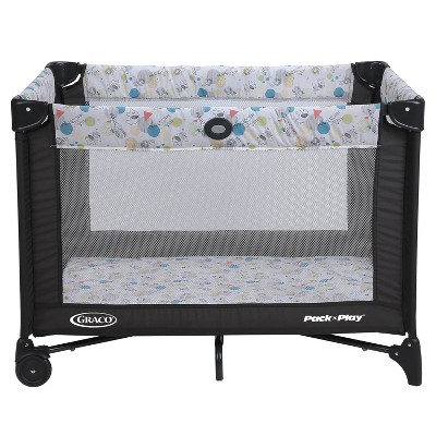 Compact Black and White Portable Playard with Mesh Sides